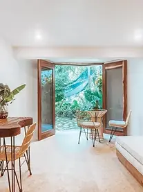 This casita opens to a tranquil tropical garden within Amari’s eco-crafted design, merging indoor serenity with lush outdoor calm.