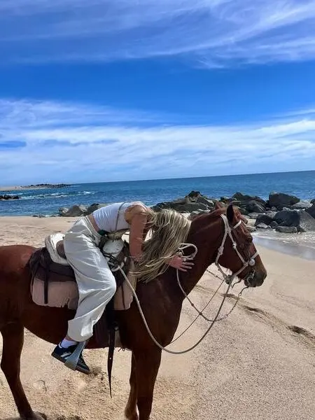 Horse and rider follow the tide on Sayulita’s untouched shore — a family-friendly seaside retreat of balance, freedom, and quiet calm.