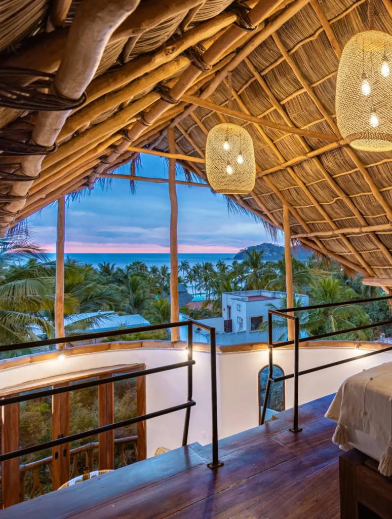 View from palapa at twilight over Banderas Bay—a sanctuary for a holistic sojourn with ocean-view stillness.