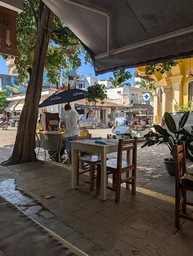 Open-air patio seating at Tierra Viva looks onto Sayulita’s lively street, offering an inviting backdrop for enjoying traditional and international breakfast dishes
