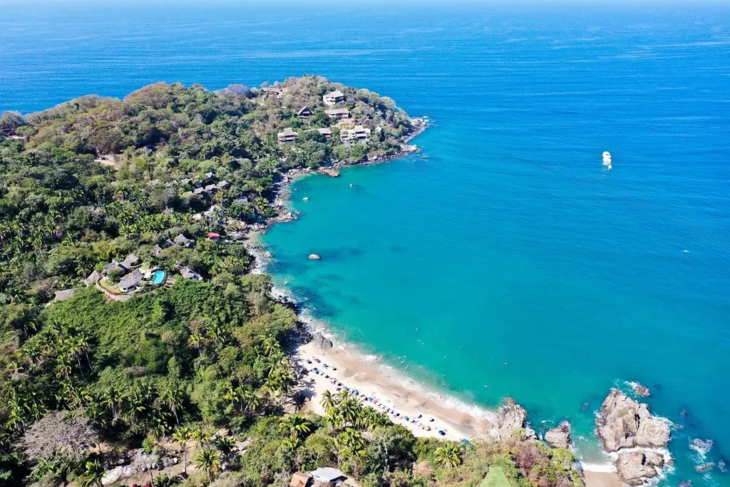 Amber light ripples across Pacific waves near Amari’s top-rated boutique hotel—morning serenity unfolding along the Riviera Nayarit Shoreline.