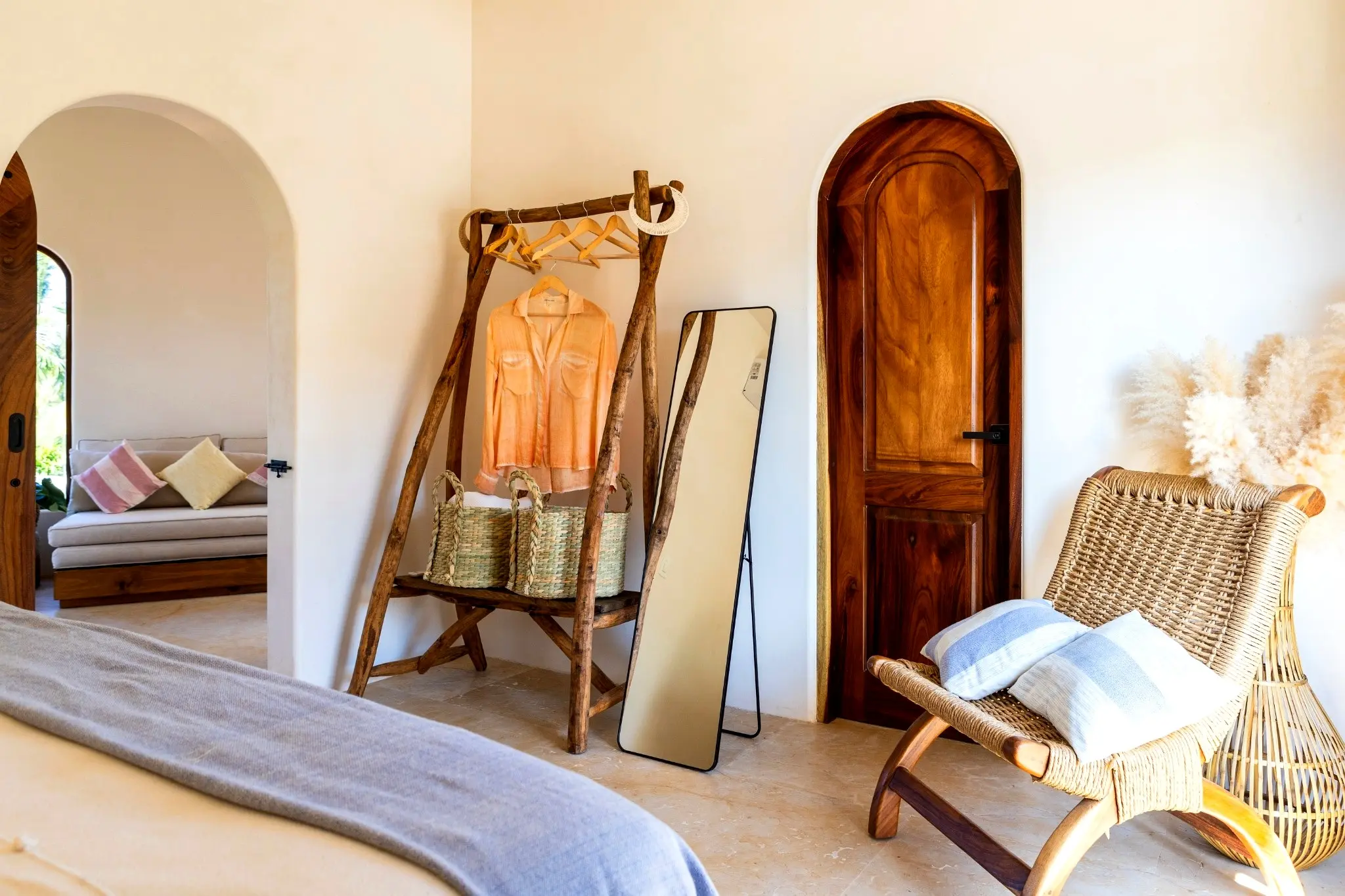 Handcrafted Details with Woven Chair and Arched Doorways