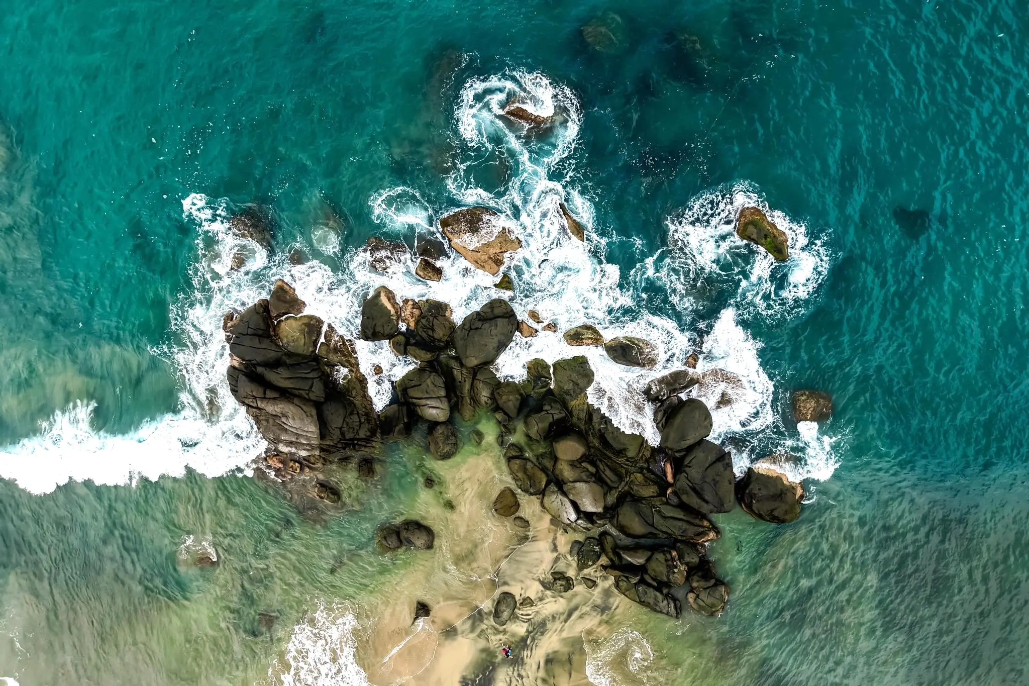 White spray erupts where waves strike Muertos Cove’s rocky cliffs—the wild energy of the Western Riviera of Nayarit in motion.