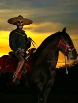 A charro rides at sunset in full attire, capturing dramatic heritage and evening energy along Mexico’s Pacific Riviera.