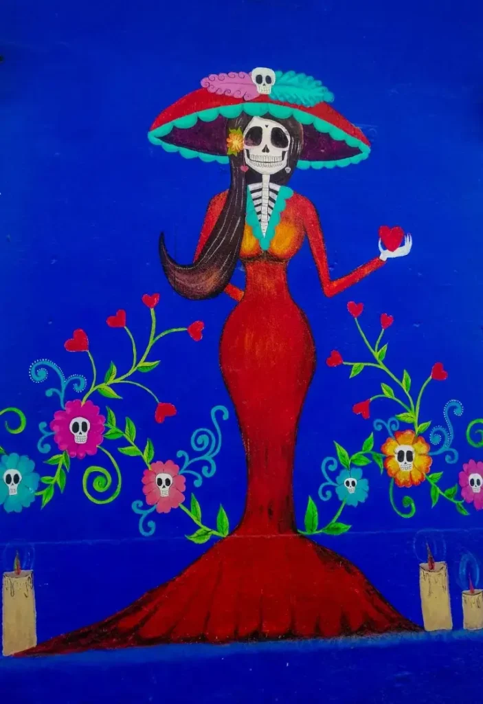 Loft-style suite at Amari Boutique Hotel features a woven palapa ceiling, wood ladder stairs, arched doorway, and warm natural textures.