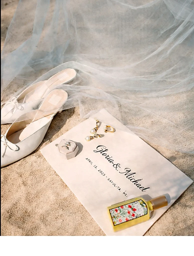 A minimalist wedding planner cover design with soft blue and gold watercolor accents and an elegant monogram, reflecting calm, intentional planning.