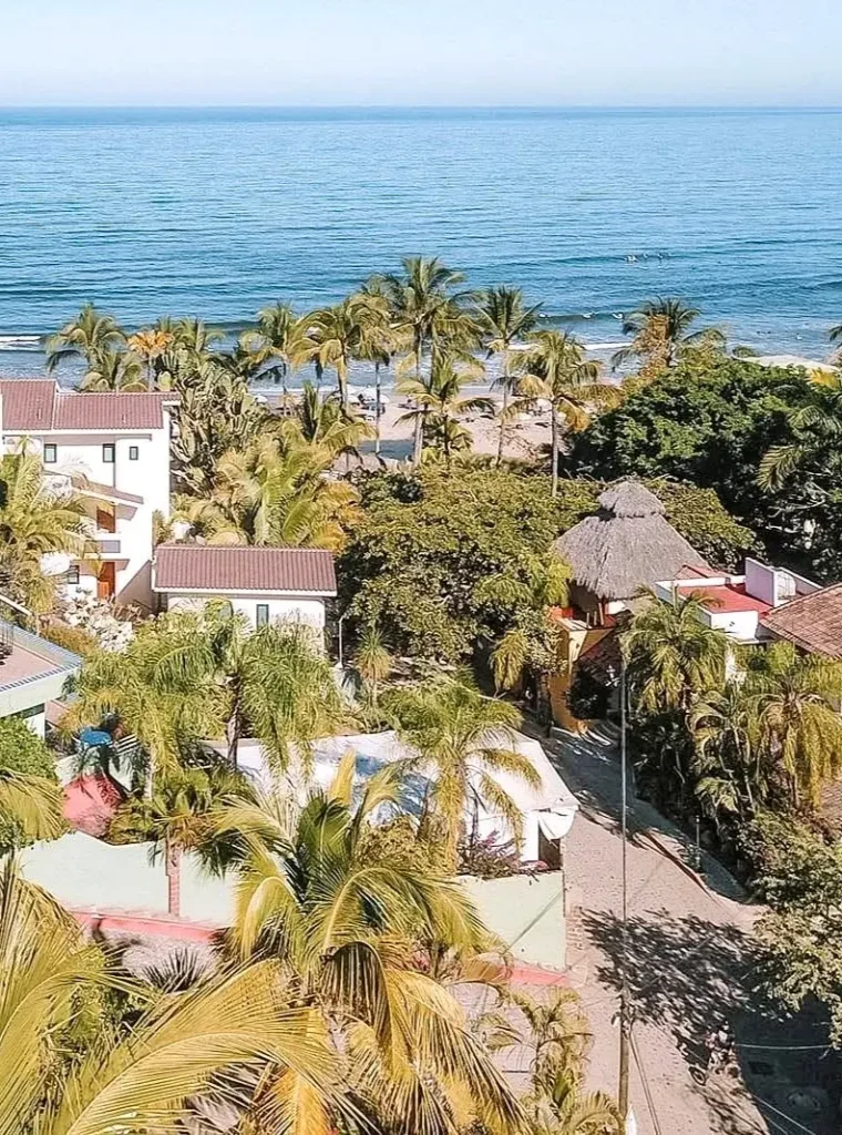 Elevated view of the North Side neighborhood with tropical landscaping and easy walking access to Playa Norte.