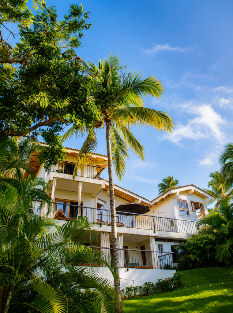Colorful boutique hotel building among palms in Sayulita, Nayarit, Mexico