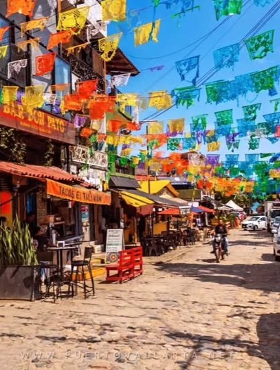 Colorful street of shops and restaurants in Sayulita town, Nayarit, Mexico